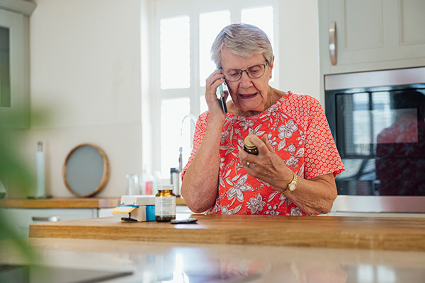 Person ordering a prescription on the phone